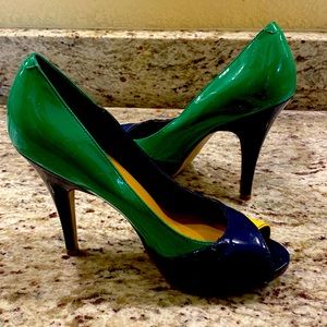 Beautiful, multi- colored NINE WEST peep toe pumps.
